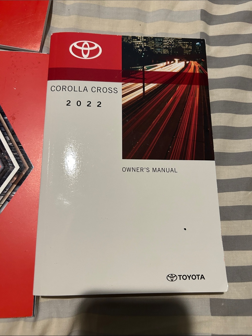 Toyota Corolla Cross 2022 Owner's Manual - White & Red